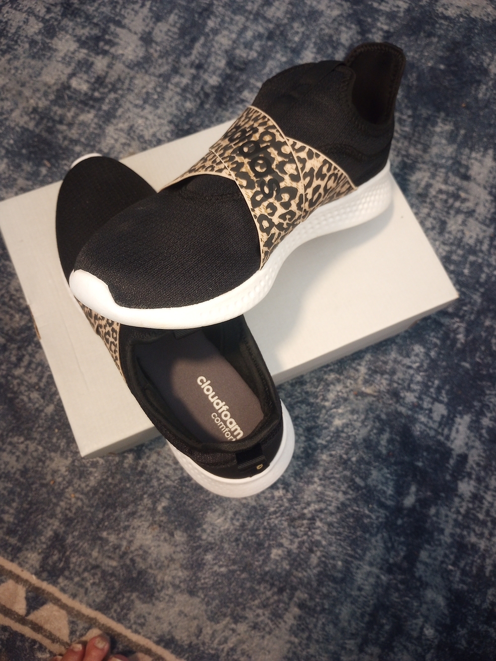 Skechers Women's Black Slip-On Sneakers with Leopard Print Band